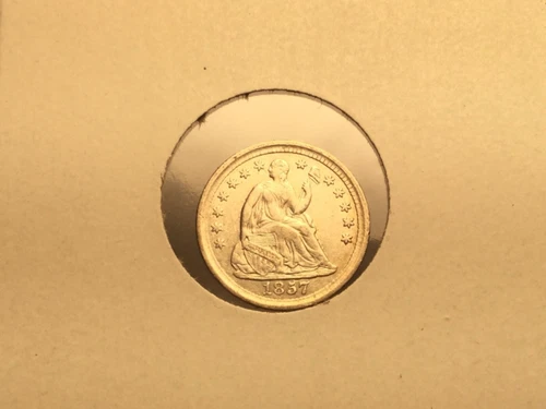 1857 Seated Liberty Half Dime in almost uncirculated