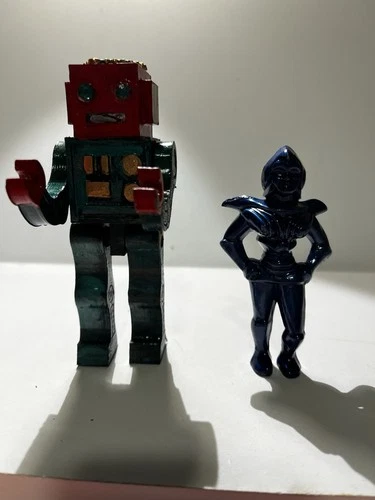 Archer Space Female Figure and  Other Toy Robot .