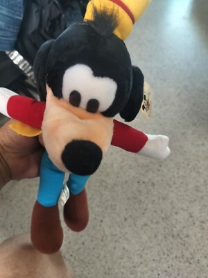 Disney Store Pluto Plush  Exclusive Stuffed Dog Sitting 16 inches Long