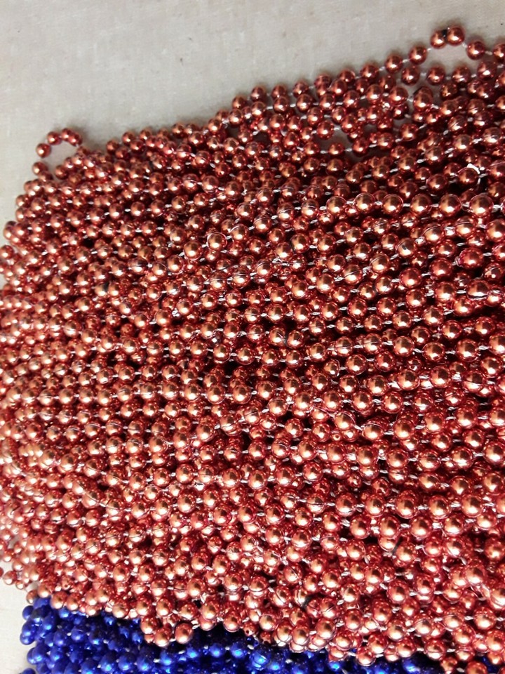 what do beads signify at mardi gras