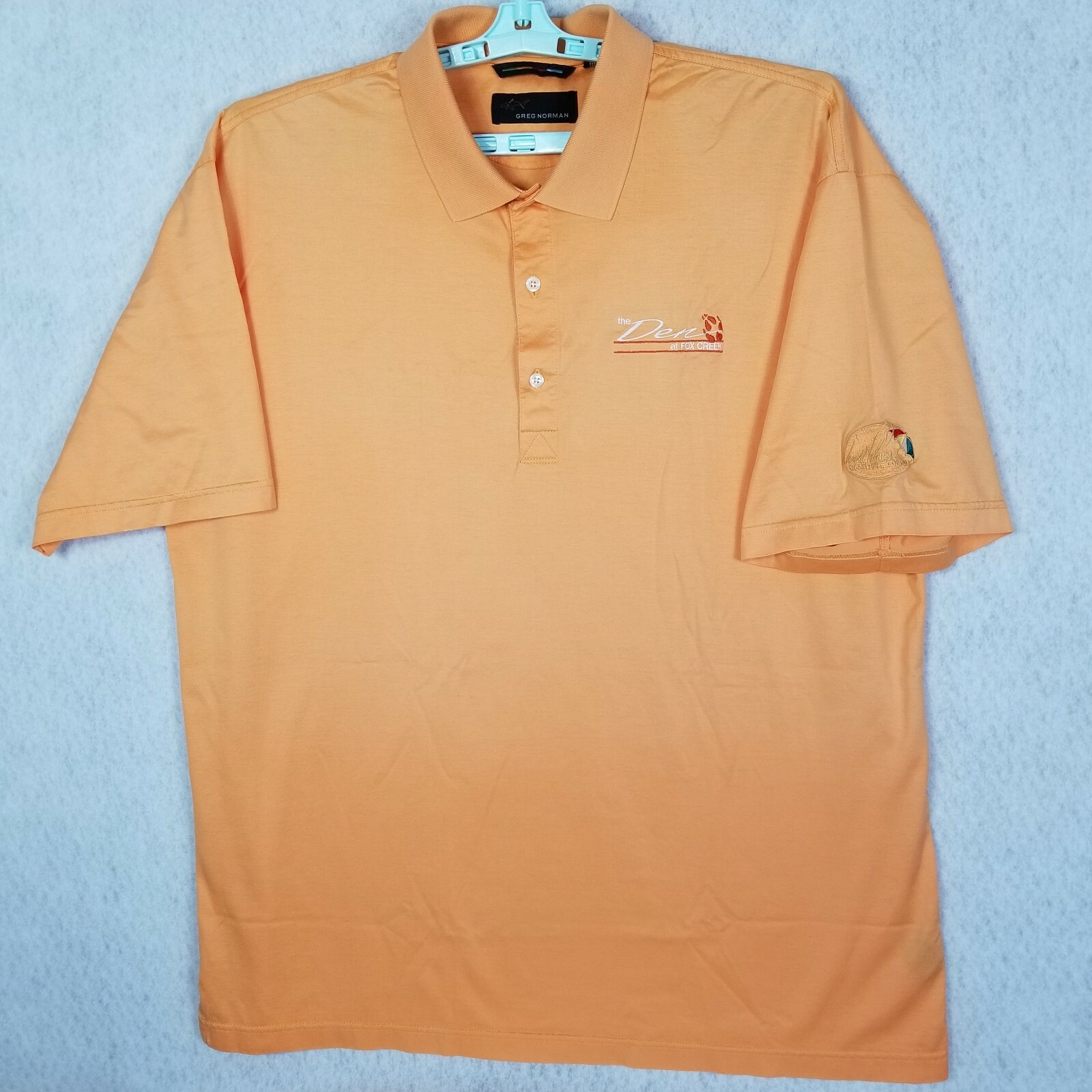 greg norman yellow golf shirt
