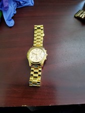 Orologio Michael Kors acciaio inox MK-1038 tono oro. Ha bisogno di batteria