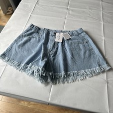 Brand new In The Style light blue frayed denim shorts, size 18.
