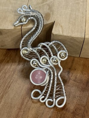 Handmade  peacock-shaped Pendant constructed from  White Copper