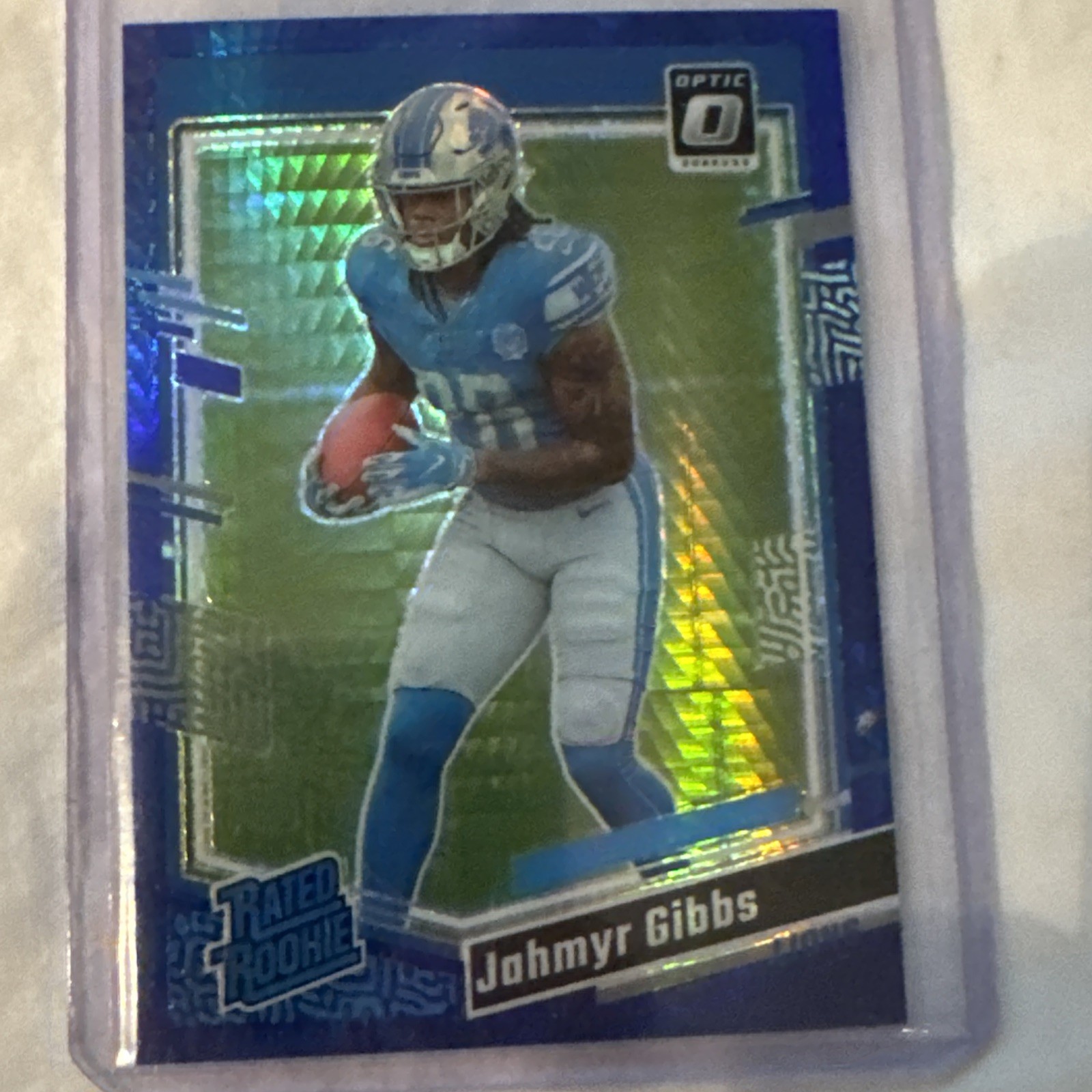 2023 Donruss Optic Jahmyr Gibbs Blue Hyper Prizm Rated Rookie #236 Lions