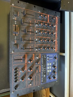 Roland DJ-2000 Professional 4-Channel DJ Mixer with DSP Effects and MIDI Sync