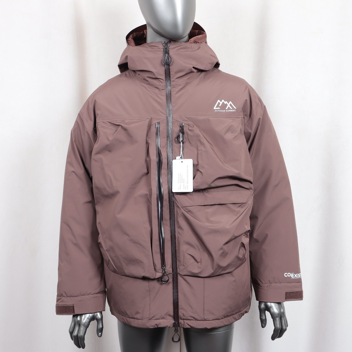 CMF COMFY OUTDOOR GARMENT GUIDE DOWN COEXIST L7 JACKET IN MOKA 
