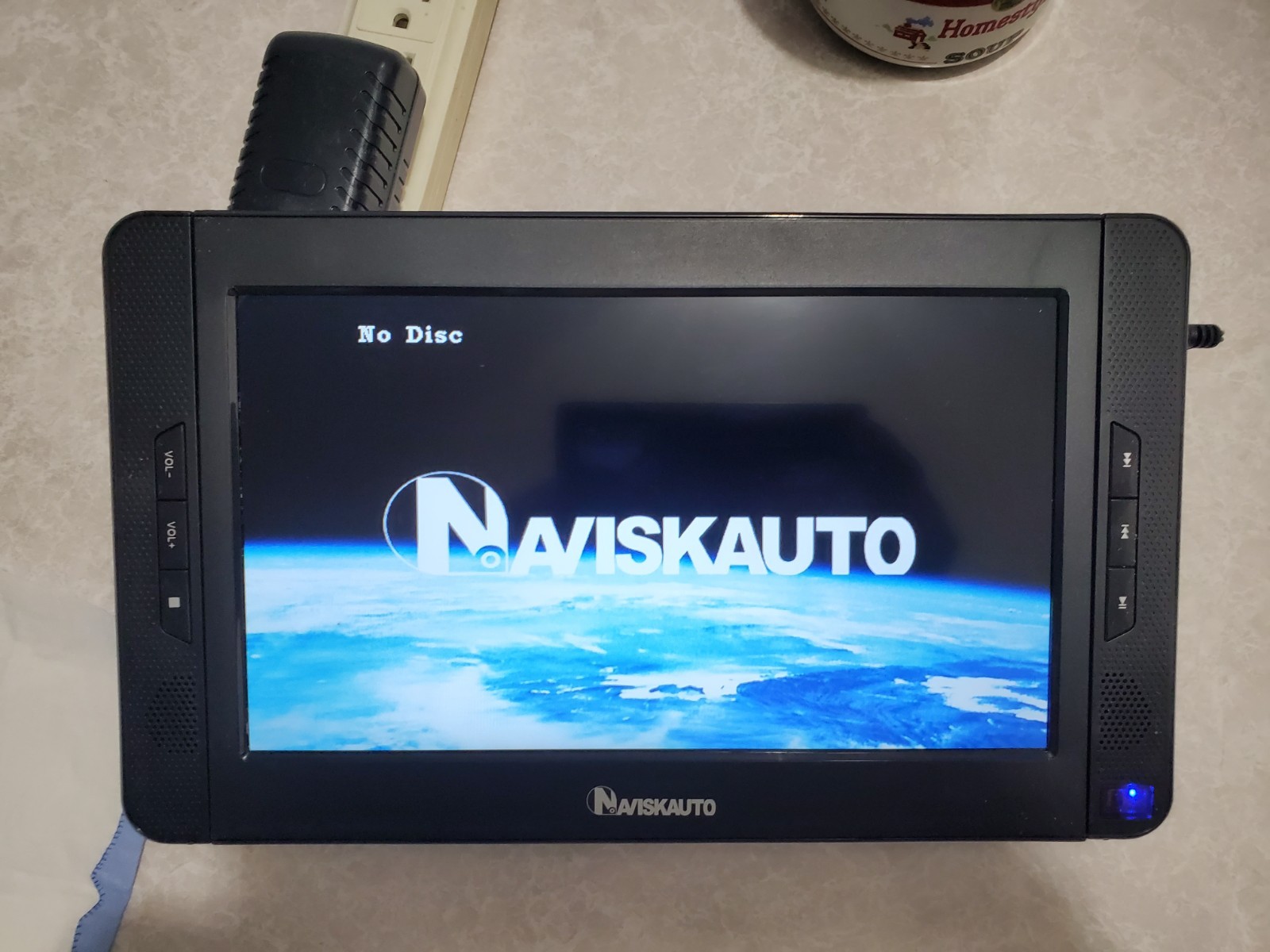 NAVISKAUTO BP-CH1014B Mobile DVD Player/Monitor  10-Inch Scr
