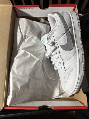 Nike Dunk Low SE  sneaker in a Summit White, Metallic Silver, and Glacier Ice