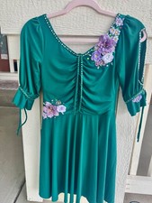 size CL green lyrical dance costume with lavender flowers and accents.