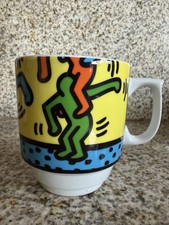Taza de té de café apilable con fondo Kieth Haring de Konitz