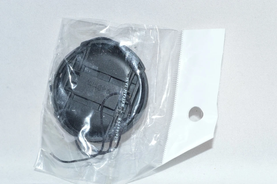 (NEW) Nikon 49 mm Rigid Plastic Tab Lock Front Lens Cap. (FLC-216) - Image 3 of 4