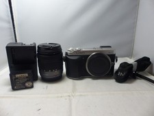 Panasonic LUMIX DMC-GX7 The SHUTTER COUNT is only  250   Two hundred fifty 