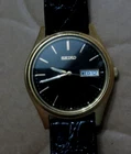 Seiko Men's Day/Date Gold Tone Quartz Watch 7N43-9048 New Battery Black dial