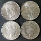 Three 1922 and One 1924 $1 Peace Silver Dollars