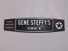 Vintage Gene Steffy's Chrysler Fremont Nebraska Plastic Dealer Badge Emblem Tag