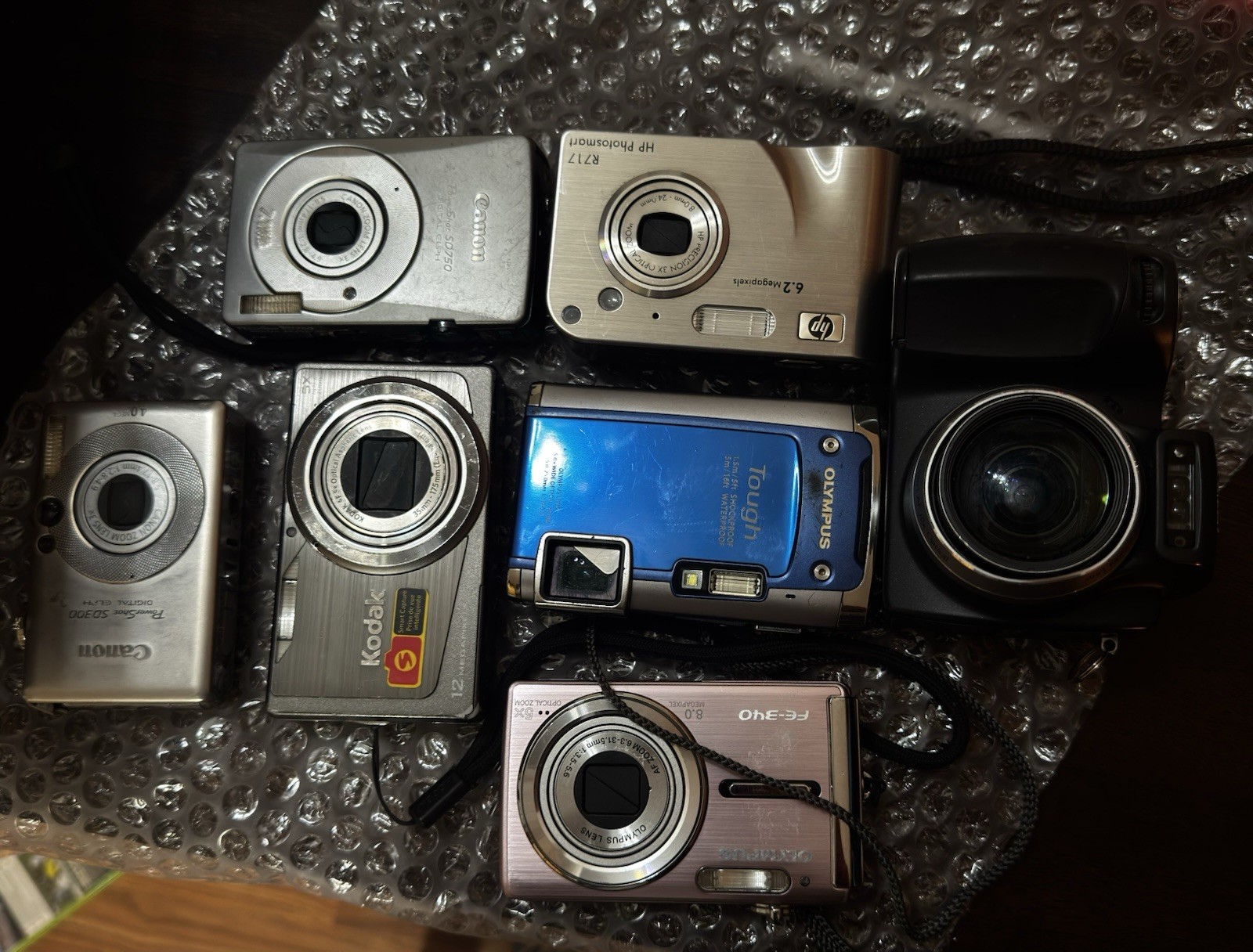 Lot of 7 Cameras Olympus Canon Kodak and Hp for Parts Only Not Working