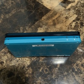 Nintendo 3DS Handheld System Aqua Blue 5 Games Charger 2GB Memory Card Case
