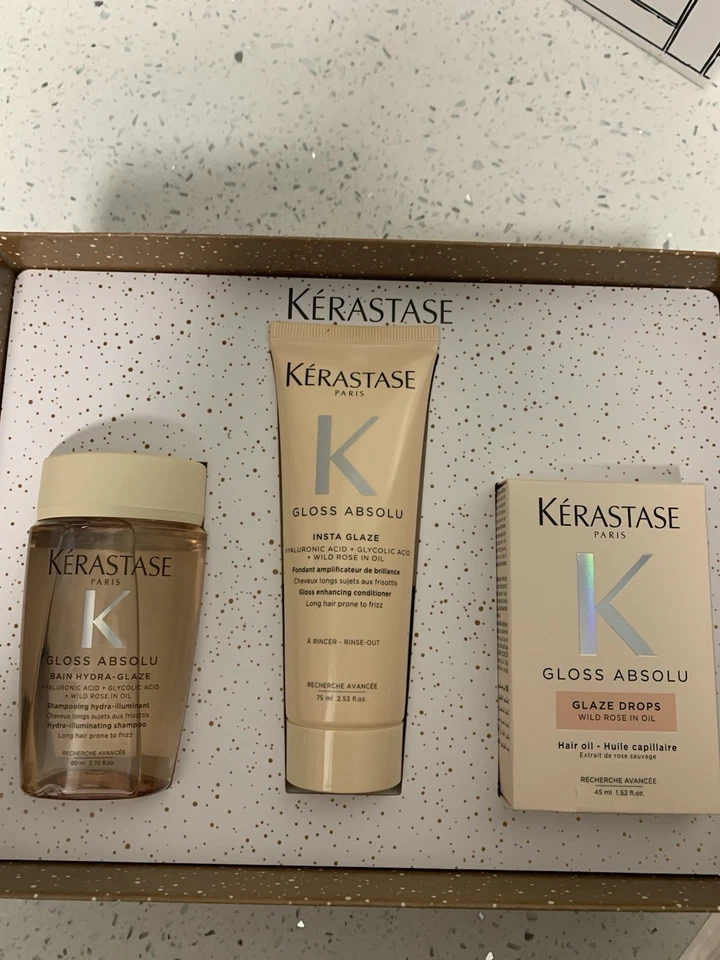 Kerastase Brillo Absolu Trio Set con Champú Acondicionador y Gotas Esmalte Foto 2 de 4