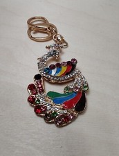 Zestaw 2 wielokolorowych austriackich kryształowych emaliowanych breloków z pawia i lustra 