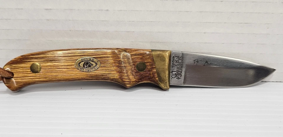 Cuchillo de hoja fija con mango de madera limitado Schrade Ducks con funda de cuero SDUPH2 Foto 2 de 4