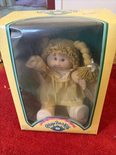 Cabbage Patch Kids 1985 blond girl Blue eyes  yellow outfit new in box