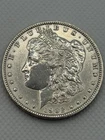 1902-P Better Date MORGAN SILVER DOLLAR. Our Opinion is AU Cleaned.