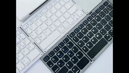 MINI FOLDABLE BLUETOOTH KEYBOARD with TOUCHPAD for IOS ANDROID WINDOWS UNIVERSAL - Video 1 of 1