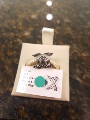 Authentic Chamilia X's and O's- Peach and Light Pink CZ Charm