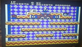 Cartucho y funda antipolvo Snow Brothers (NES, 1991) solamente, algunos da&ntilde;os, probado