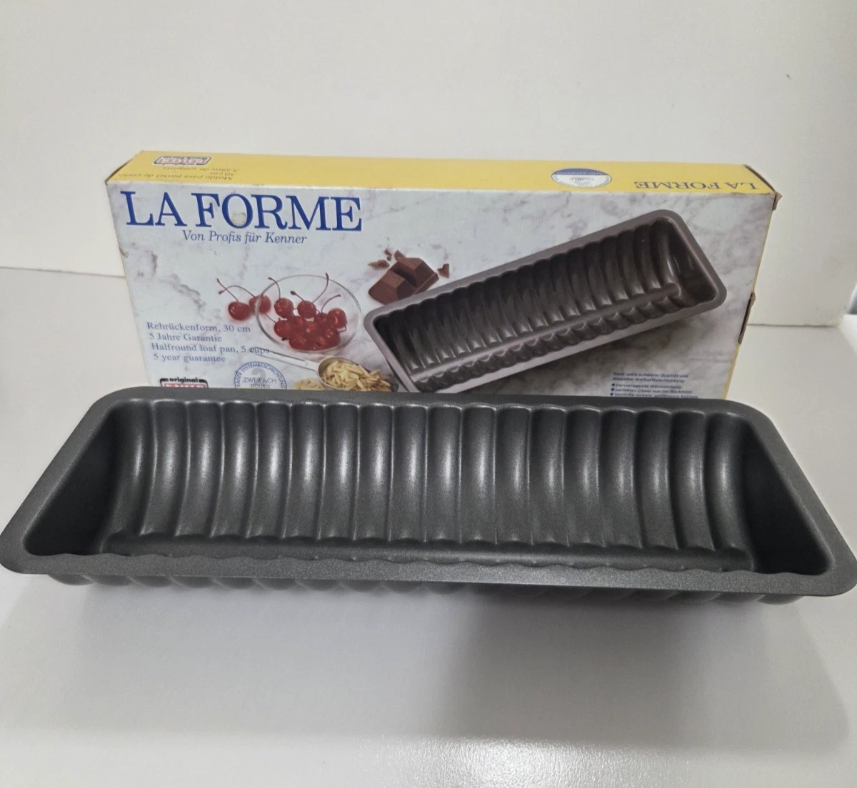 La Forme Half Round Loaf Pan Almond Cake Ribbed