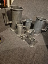 Lot de 7 mesures en étain anciennes