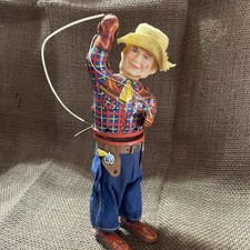 Antique Tin Wind Up Toy Cowboy Swinging a Lasso Celluloid Head 1950 s