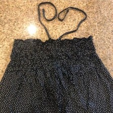 girl's black strapless dress with silver design