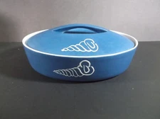 Blue Oval covered casserole decorated with fish and shells