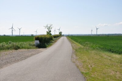 Photo 6x4 Continuation of Wold Road with the wind farm behind Great Addin c2009