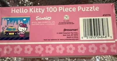 PUZZLE-HELLO KITTY-Sanrio-100 Piece-12.5”x 15”-Hello Kitty, Taxi