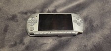 Sony PSP-3001 Silver- 5 games - Tested, Working - shell scratched