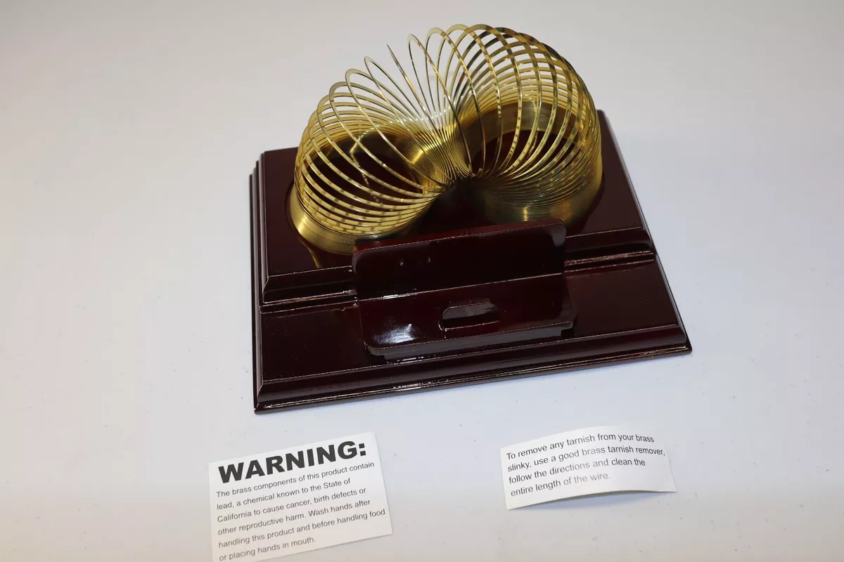 Brass slinky sales