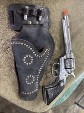 VINTAGE / ANTIQUE 1950s NICHOLS STALLION 38 CAP GUN WITH HOLSTER AND 2 BULLETS