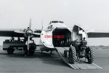 PHOTO  BRISTOL SUPERFREIGHTER LOADING A TRACTOR 1960