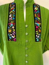 Typical Mexican blouse with hand embroidery made by Oaxacan artisans.
