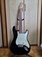 Squier Stratocaster Black Tiger Eye Birdseye