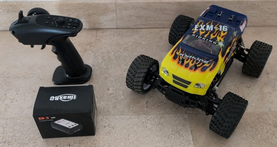 AUTO RADIOCOMANDATA 2.4GHZ EXM-16 MONSTER TRUCK 1:16 MOTORE RC-380 RTR HIMOTO  - Immagine 2 di 4