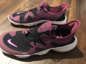 maroon athletic shoes