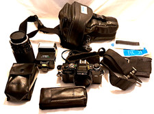 Minolta X-700 SLR 35mm Film Camera BlK Promaster Spectrum f 35-200mm Lens X-tras