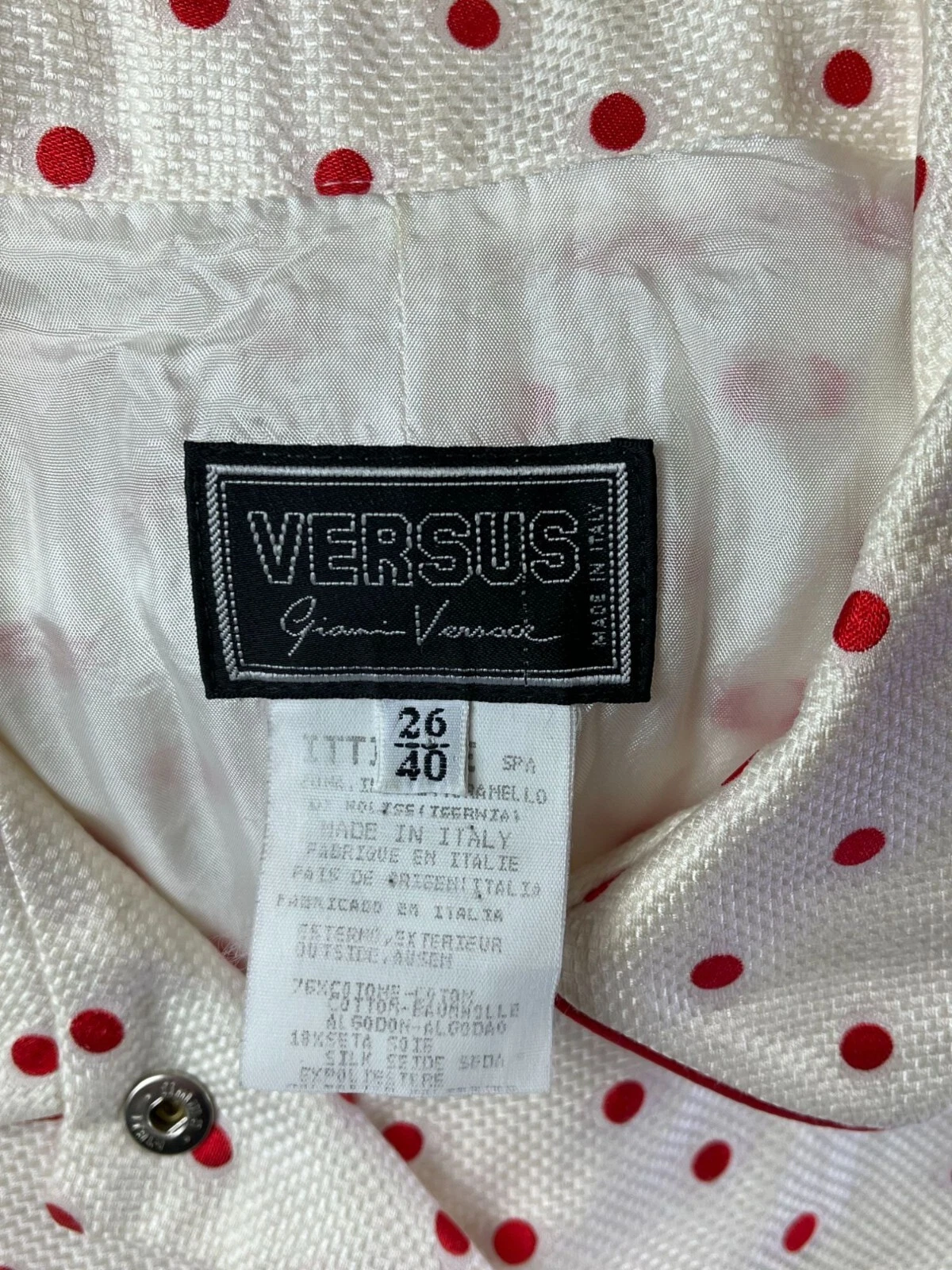 Abito Gianni Versace Versus anni 90 senza maniche a pois con bottoni bordo rosso colletto si