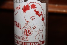 Central Beverage Auburn New York ACL soda bottle w picture Woman Telephone 1941