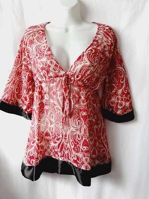 So wear it declare it red gold threaded sheer large v neck top