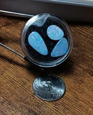 3 good sized gray Boulder Doublet Opals totaling 4.58ct nice red flash,